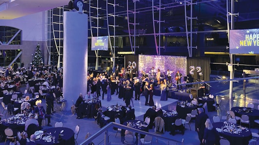 Guests dancing with live music playing.