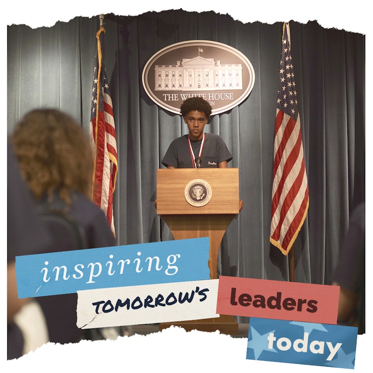 Student speaking at podium