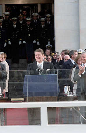 Reagan during his inaguration Reagan speaking at podium at his inaguaration