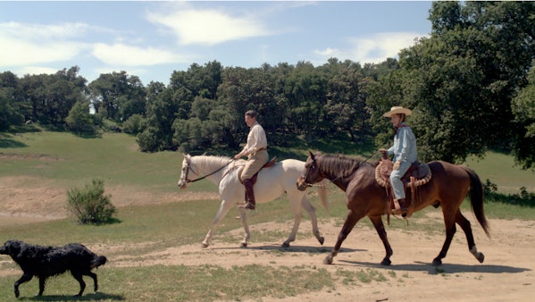 Nancy and Ronnie riding horses