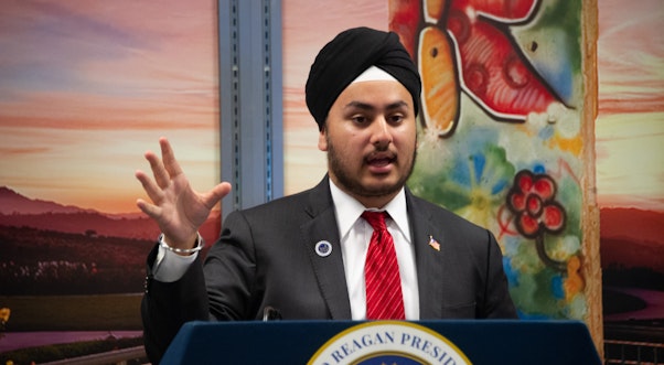 Male debate participant at the podium