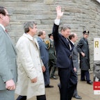 President Reagan waving to a crowd, on the day of the assasination attempt